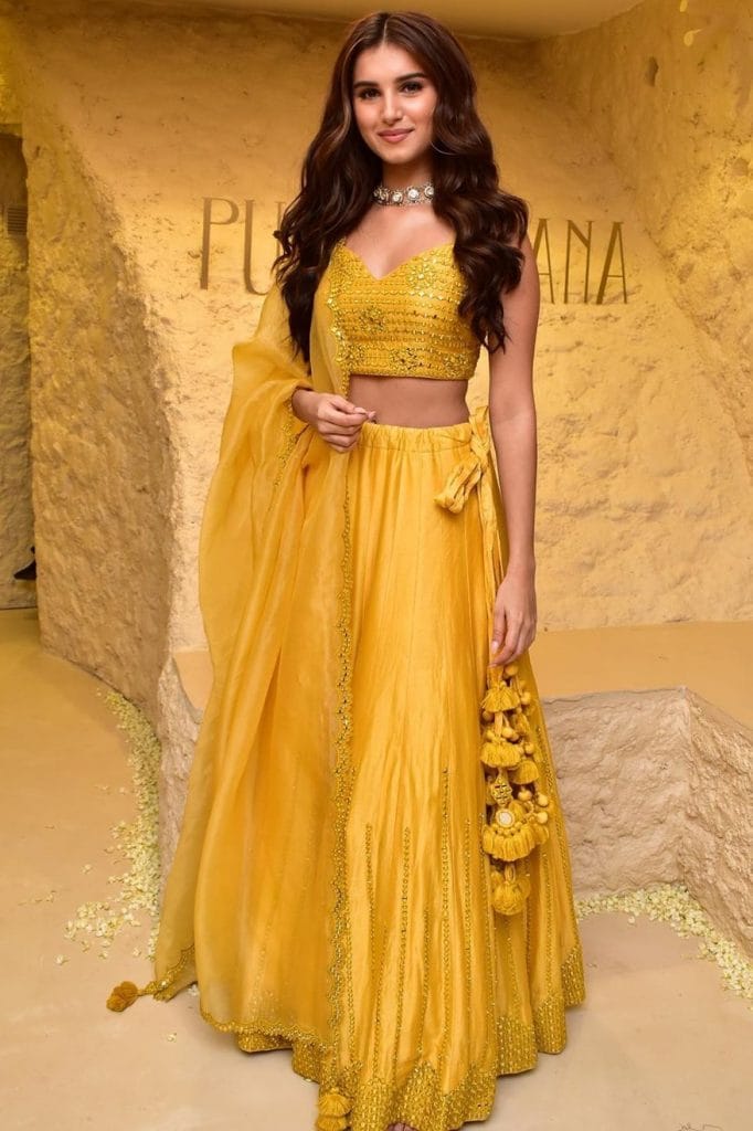 Tara Sutaria in yellow monochrome Punit Balana lehehnga with dupatta saet