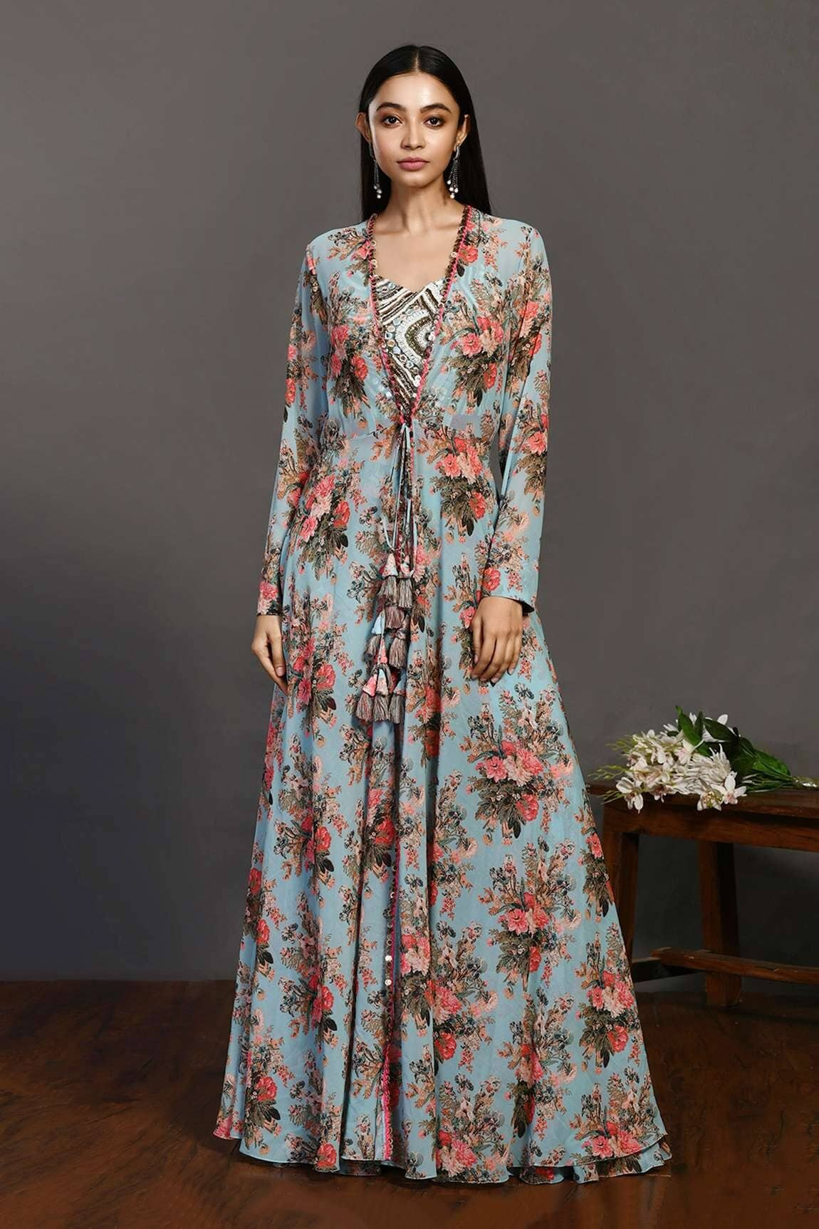 New Designers launch. Floorlength blue floral jacket with matching pants from Onya