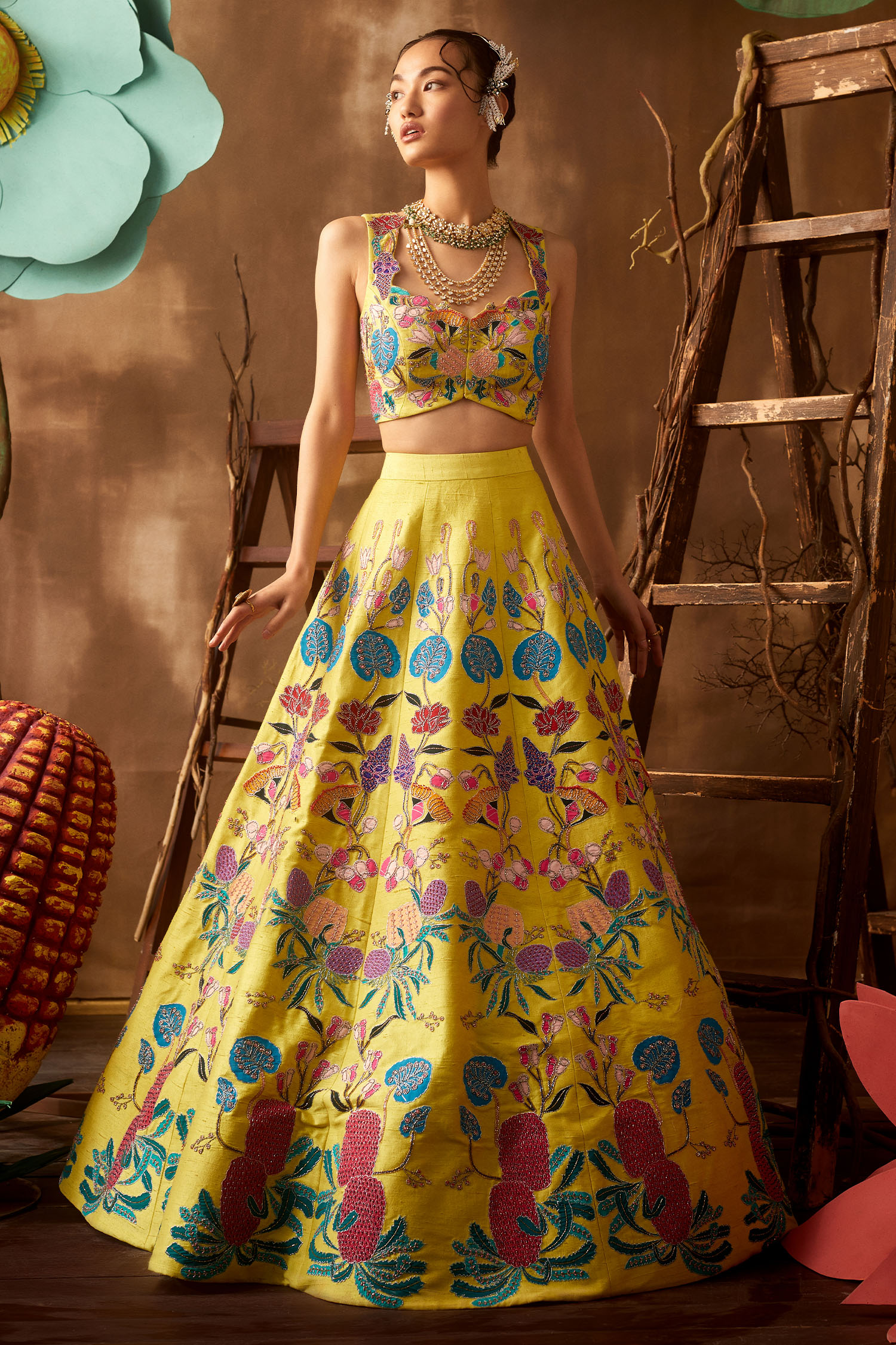 Yellow embellished lehenga set from Pastiche collection