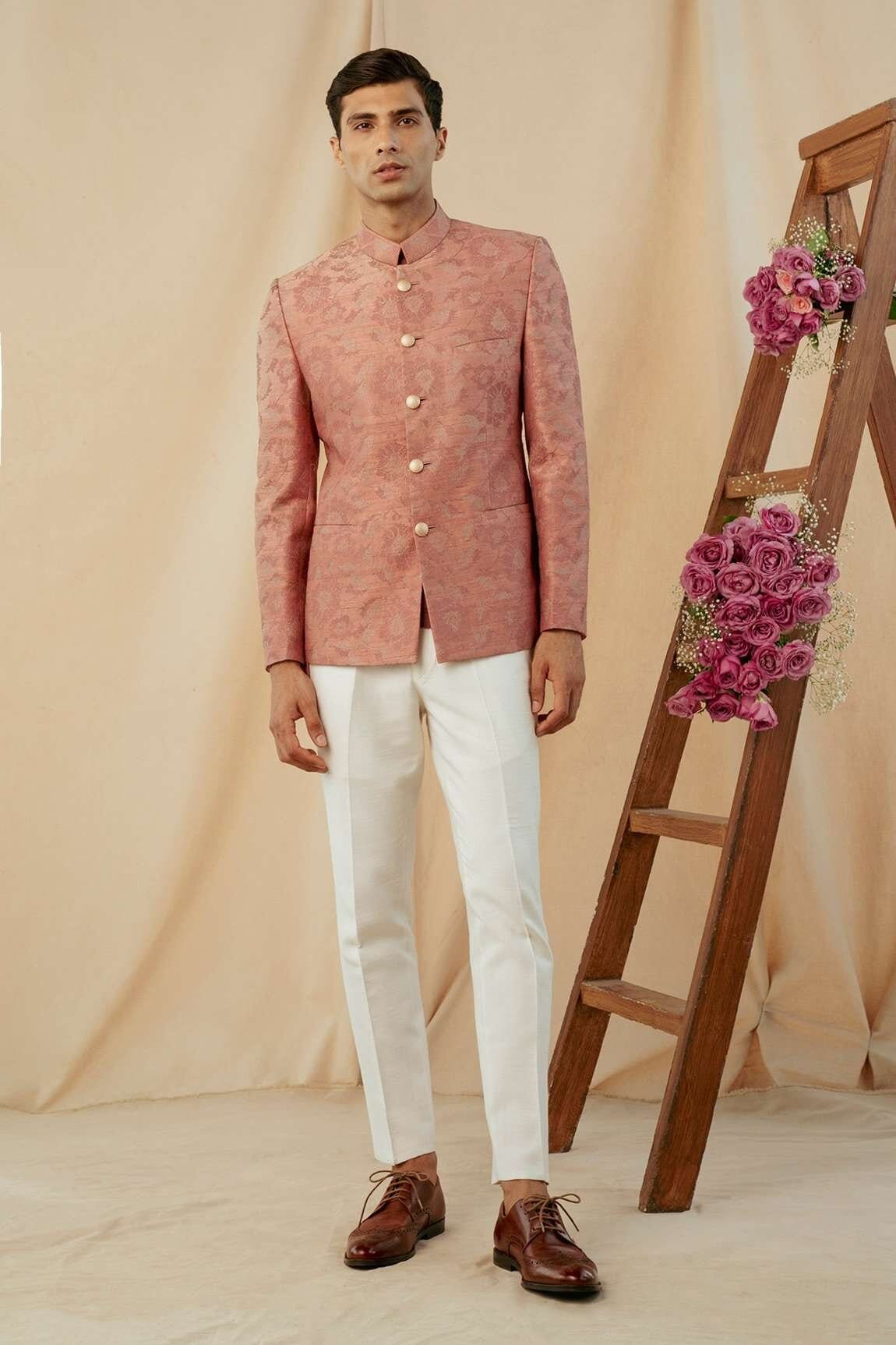 Matching diwali couple looks with philocaly's pink silk bandhgala for men. Festive looks for men. 