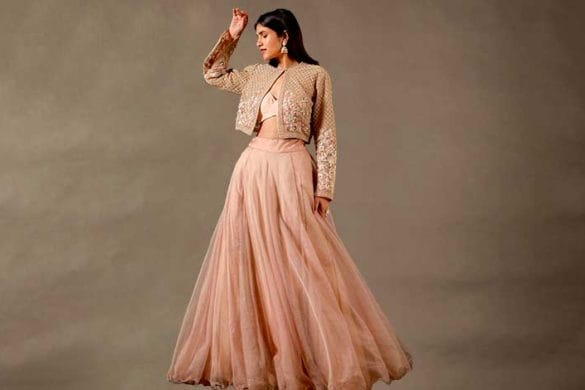 A woman wearing a bridal lehenga and different blouse designs, hairstyles, and accessories to style it for other occasions. Tips and dos and don'ts are provided to help repurpose the bridal lehenga without upstaging the bride.