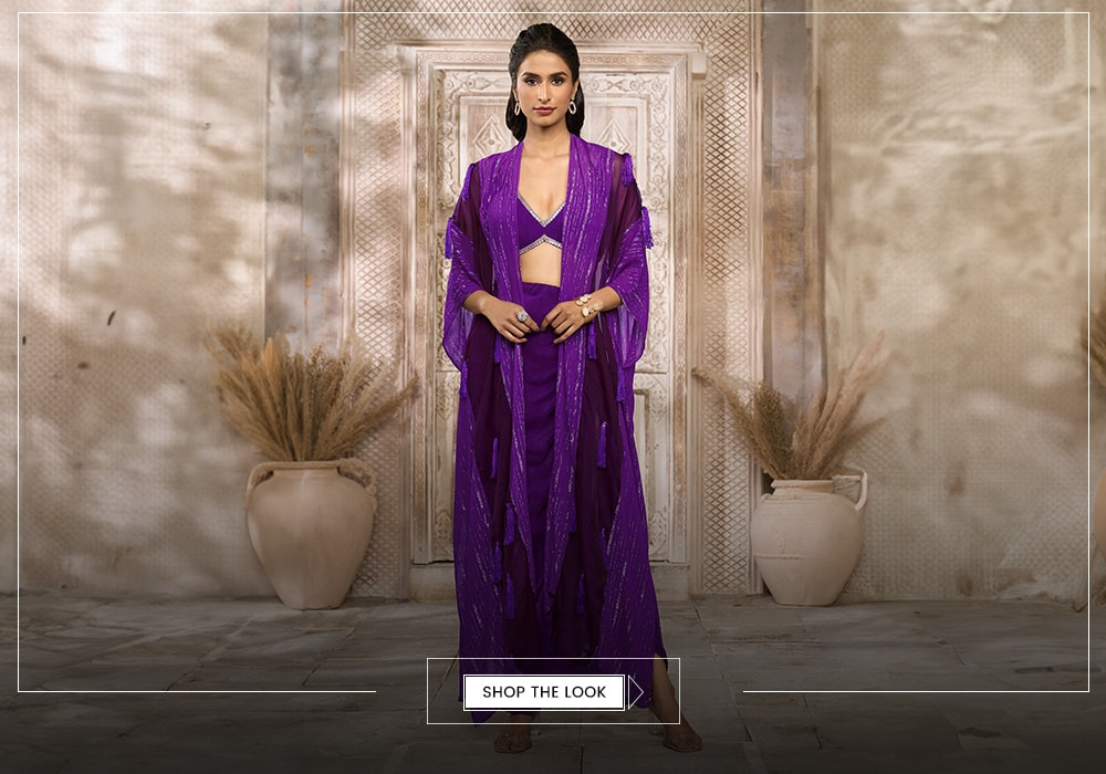 Purple Crepe Embroidered Tassel Plunged V Draped Skirt Set With Cape For Women RISHI & VIBHUTI X AZA Opulent Essence