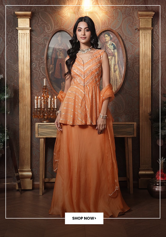 orange lehenga by surbhi arya